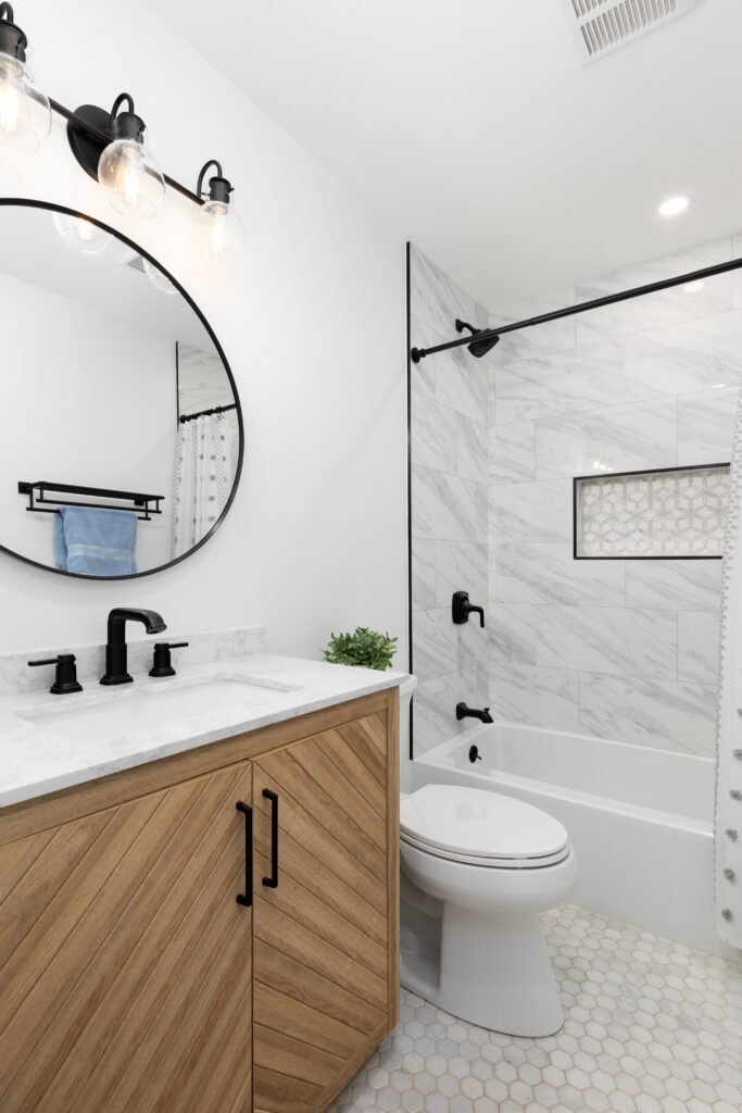 a,bathroom,with,a,white,oak,cabinet,,white,marble,countertop,